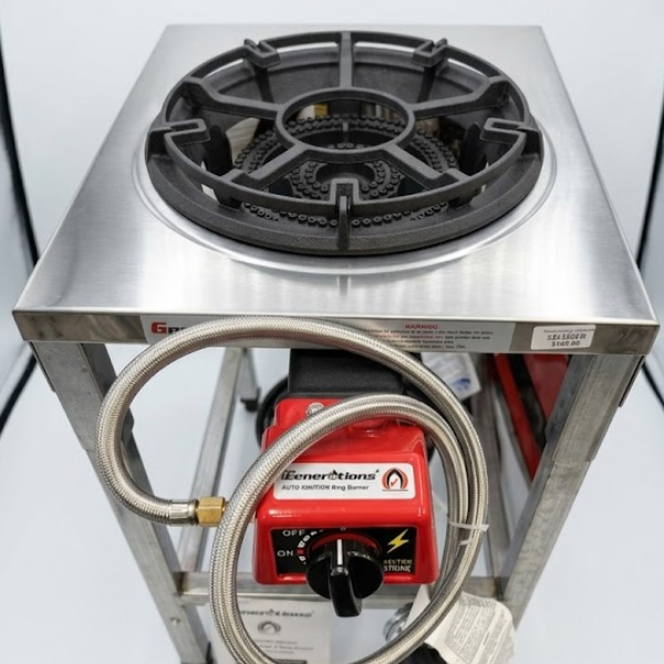 Professional 2-ring LPG gas stove with stainless steel regulator and heavy-duty outdoor stand.